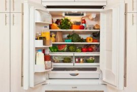 Interior view of refridgerator with healthy food - Karen Moskowitz/The Image Bank/Getty Images