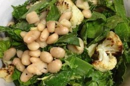 white bean and cauliflower salad with avocado and leafy greens