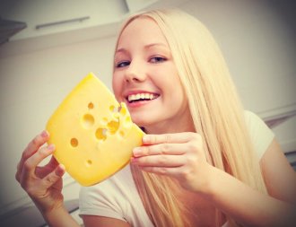 Woman holding cheese